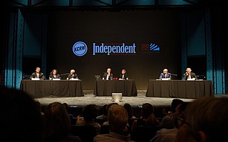 From left: Hal Conklin, Cathy Murillo, Harwood "Bendy" White, moderators Jonathan Bastian and Nick Welsh, Angel Martinez, and Frank Hotchkiss at a mayoral candidate debate in SBCC's Garvin Theatre