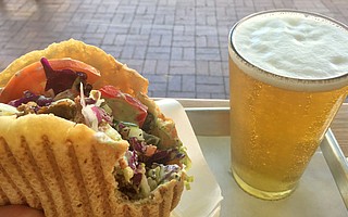 A doner kebap with everything is served fast and works well with a Krombacher Pils.