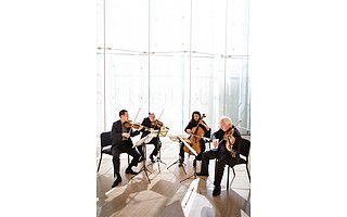 The current Juilliard String Quartet consists of (from left) Joseph Lin, Ronald Copes, Astrid Schween, and Roger Tapping.