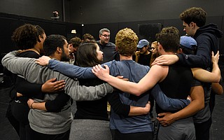 Irwin Appel (center) huddles with his cast.