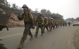 Firefighters work the Thomas Fire Saturday. (Dec. 16, 2017)