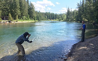 Secretary Zinke poses for a casual photo during a fishing trip to Glacier National Park.