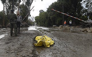 The remains of a storm victim recovered from along the train tracks at Olive Mill Road (Jan. 9, 2018)