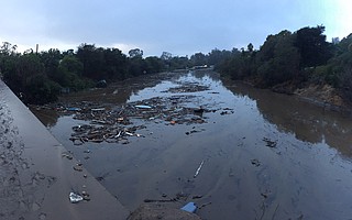 A view of Highway 101 from the Olive Mill Road overpass. The 101 is under unknown amounts of mud and debris after an early morning mudslide engulfed parts of Montecito.