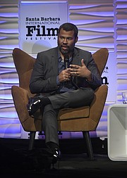 2018 Santa Barbara International Film Festival Outstanding Directors of the Year Award honoree Jordan Peele talks with moderator Scott Feinberg at the Arlington Theatre (Feb. 6, 2018) .
