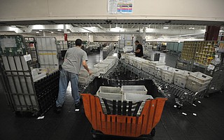 Mail is sorted at a Goleta postal processing facility.