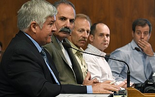 County Public Works Director Tom Fayram (left) addresses county supervisors with (from left) Office of Emergency Management Director Rob Lewin and the U.S. Forest Service’s Kevin Cooper, among others.