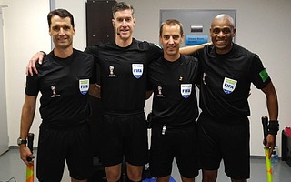 Frank Anderson (far left) is ready to take the field for the England-Colombia round-of-16 game at the World Cup. His fellow referees are Matt Conger of New Zealand, Mark Geiger of New Jersey, and Joe Fletcher of Canada. In the South Korea–Germany game, Anderson’s offside call loomed large on TV.