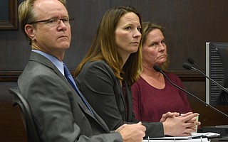 Community Development Director George Buell, far left, with City Planner Renee Brooke, center