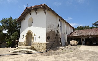 The main chapel at La Casa de Maria (pictured) took a direct hit during the 1/9 Debris Flow. A few feet of mud, boulders, and branches flooded inside.