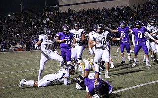 Righetti's Adan Solis dives into the end zone.