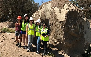 Among the researchers in UCSB's studies of the Montecito disaster are Erica Akemi Goto (left), Michelle Shteyn, Sarah E. Anderson, Violeta Contreras, and Summer Gray, pictured here at a boulder that washed down-canyon during the January 2018 mudflow.