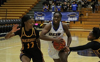 Bri Anugwom drives to the basket.