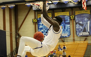 Robinson Idehen flushes a powerful dunk.
