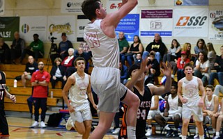 Tommy Condon goes up for a layup.