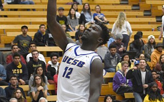 Amadou Sow (12), shown dunking against Sacramento State in November, had his biggest game last Saturday in UCSB’s 73-71 basketball victory over the University of San Francisco. The 6′9″ freshman scored 21 points and grabbed nine rebounds as the Gauchos overcame a 10-point deficit. It was only USF’s second loss of the season and put UCSB at 10-3 entering the New Year.