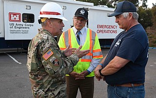 Public Works Deputy Director Tom Fayram (right) speaks with Lieutenant General Todd T. Semonite (left), Commanding General and Chief Army Corps of Engineers, soon after the debris flow.