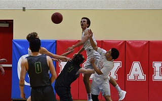 Beau Allen blocks a St. Bonaventure shot attempt.