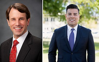 Outgoing California’s insurance commissioner Dave Jones and incoming commissioner Ricardo Lara