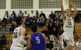 Aiden Douglas goes up for a layup.