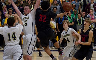 Isaiah Hicks goes up for layup.