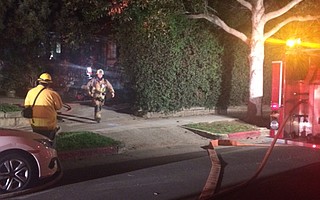 A fire at a residence on the 900 block of Bath Street flared up early this morning.