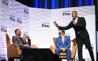 Michael B. Jordan, moderator Scott Feinberg and Jamie Foxx speak onstage at the SBIFF