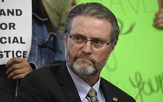 Anthony Beebe, pictured at the silent protest by black students on January 24, announced he will retire this summer from his post as president of Santa Barbara City College due to health issues.