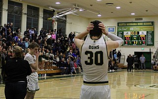 Bryce Warrecker and Jasper Johnson react to the final buzzer.