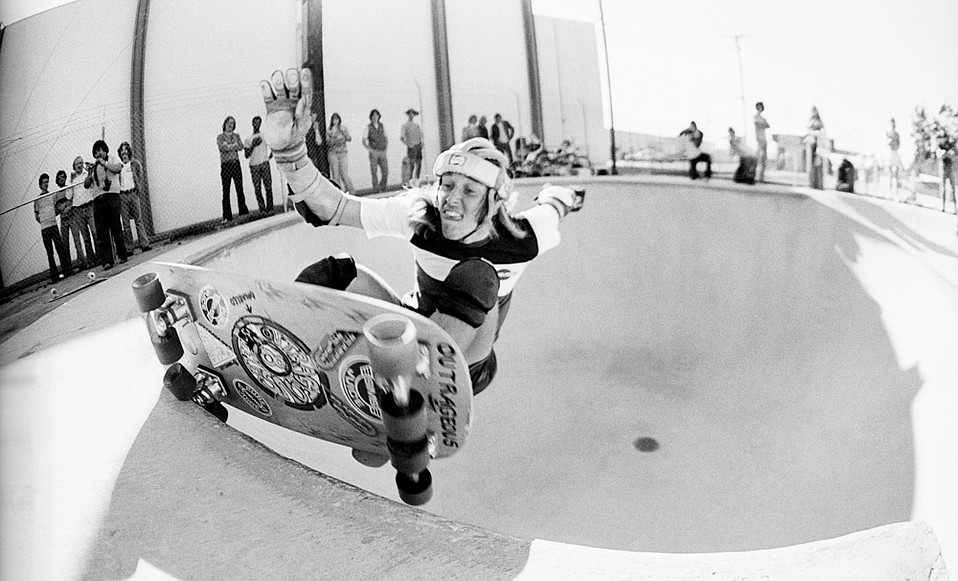 Among legions of fanatics who recognize Ventura’s Lonnie Toft (pictured at Endless Wave skatepark in Oxnard, 1977), their most common flashback showcases his innovation of the eight-wheeled skateboard. Toft said recently that after his older brother Dan turned him on to the concept, circa 1973, he promptly bought a pair of clay-wheeled roller skates at a swap meet, took them apart, and fastened them to an extra-wide skateboard deck he had cut from an old door. “I liked to have a variety of boards,” he said, “and the eight-wheeler was just part of my quiver.” Lesser known is that Toft — who rode for the Radon boats skateboard team before getting picked up by Santa Barbara–based Sims Skateboards in 1976 — built and rode some of the very first snowboards. Toft also tried to compel Tom Sims to introduce wider skateboards to the burgeoning industry. At the time, a Sims deck was skinny and pointed, like a miniature surfboard. “I told Tom, ‘Hey, there’s no offshore wind here, man,” Toft remembered recently. “We’re not surfing, okay? And I need a bigger place to put my feet.”