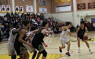 Jackson Hamilton probes the Oxnard defense.