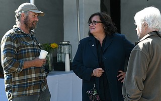 Pictured from left, Jacob Grant of Los Olivos Roots Organic Farm talks with Mayor Cathy Murillo and real estate investor Richard Berti at a public meeting to discuss future plans for De la Guerra Plaza.