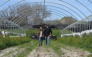 Sara Rotman and her husband, Nate Ryan, on their farm